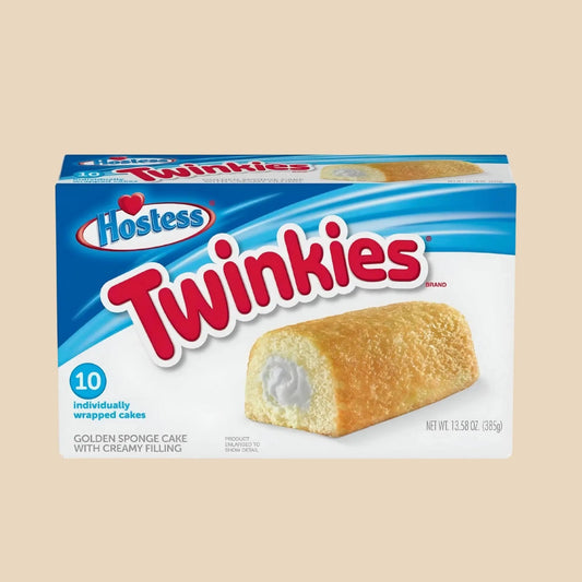 Boîte de Hostess Twinkies avec un Twinkie à la crème exposé