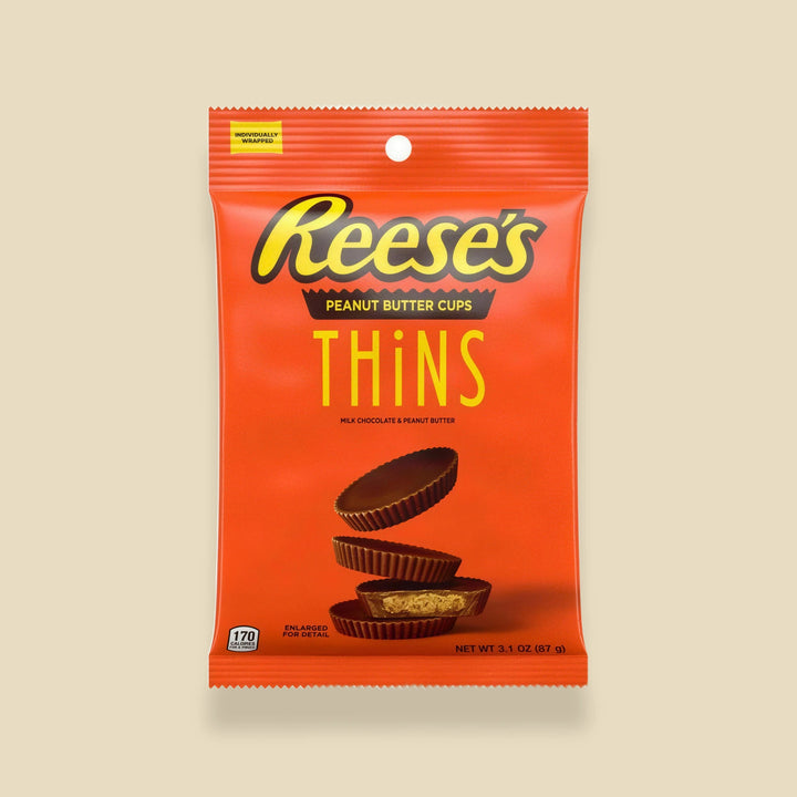 Sachet 88 g Reese's Thins Peanut Butter Cups — cups fines chocolat au lait et beurre de cacahuète, importé USA — Lollipop Korner